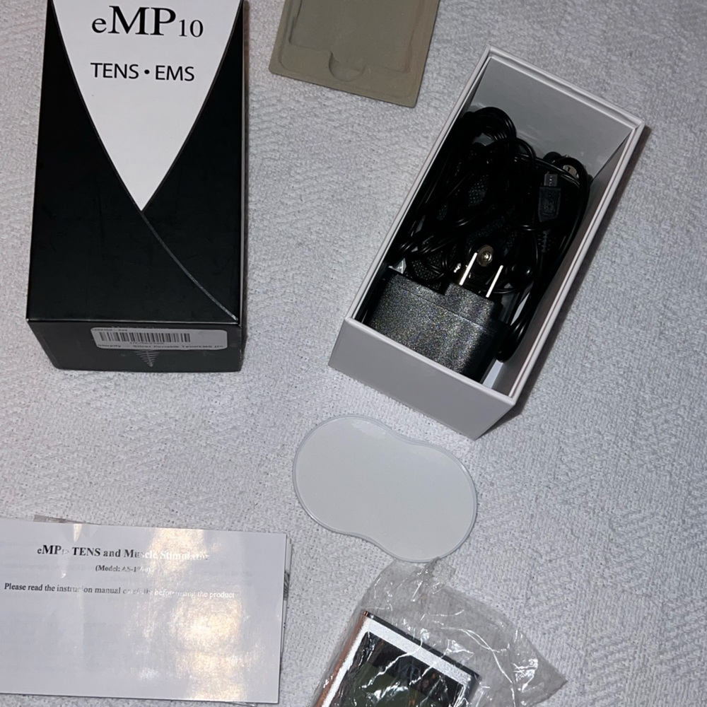 Brand new TENS portable device!! Retails over 450 plus tax!